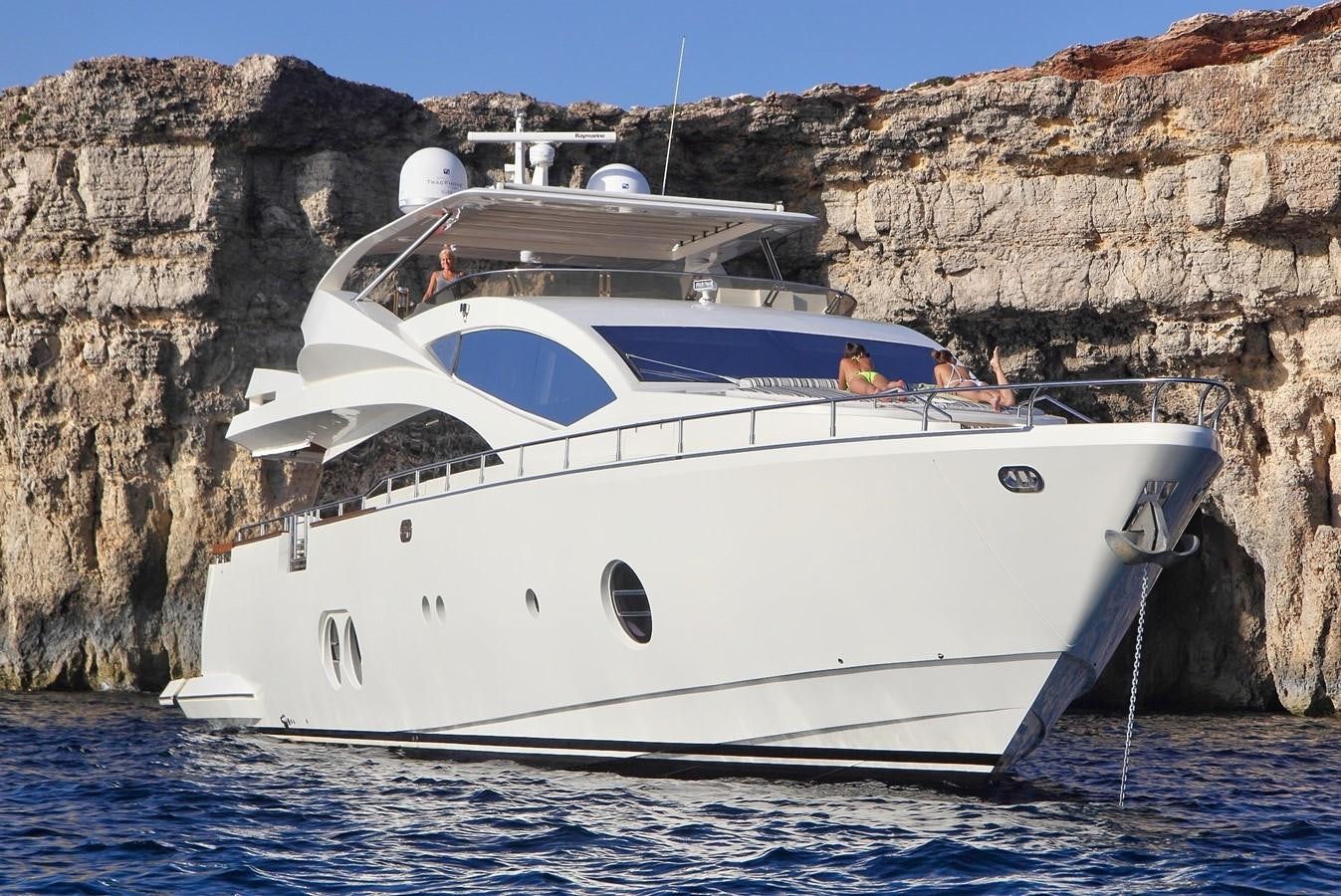 a white boat in the water aboard SICILIA IV Yacht for Sale