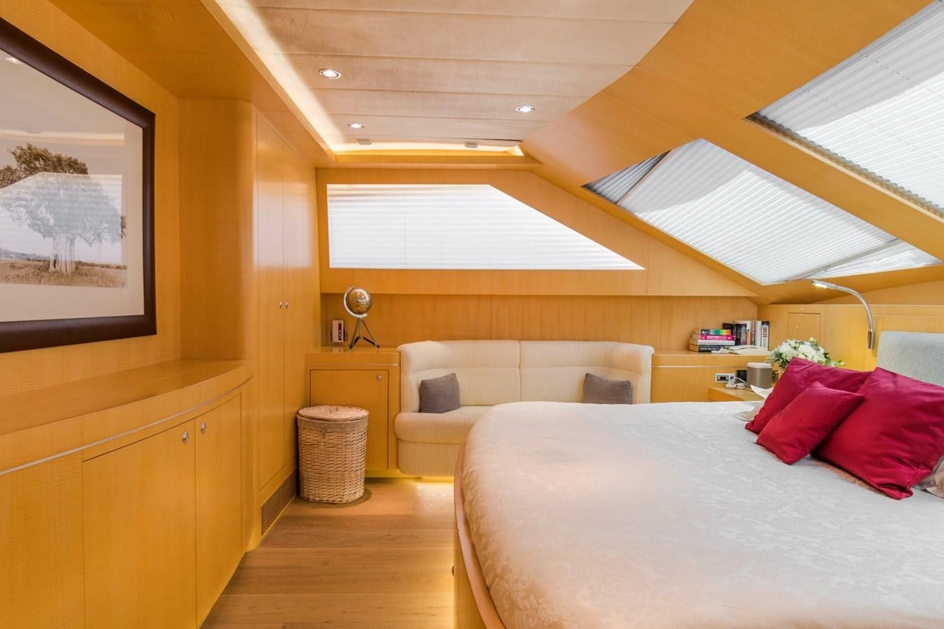 a bedroom with a bed and a couch aboard CONTE ALBERTI Yacht for Sale
