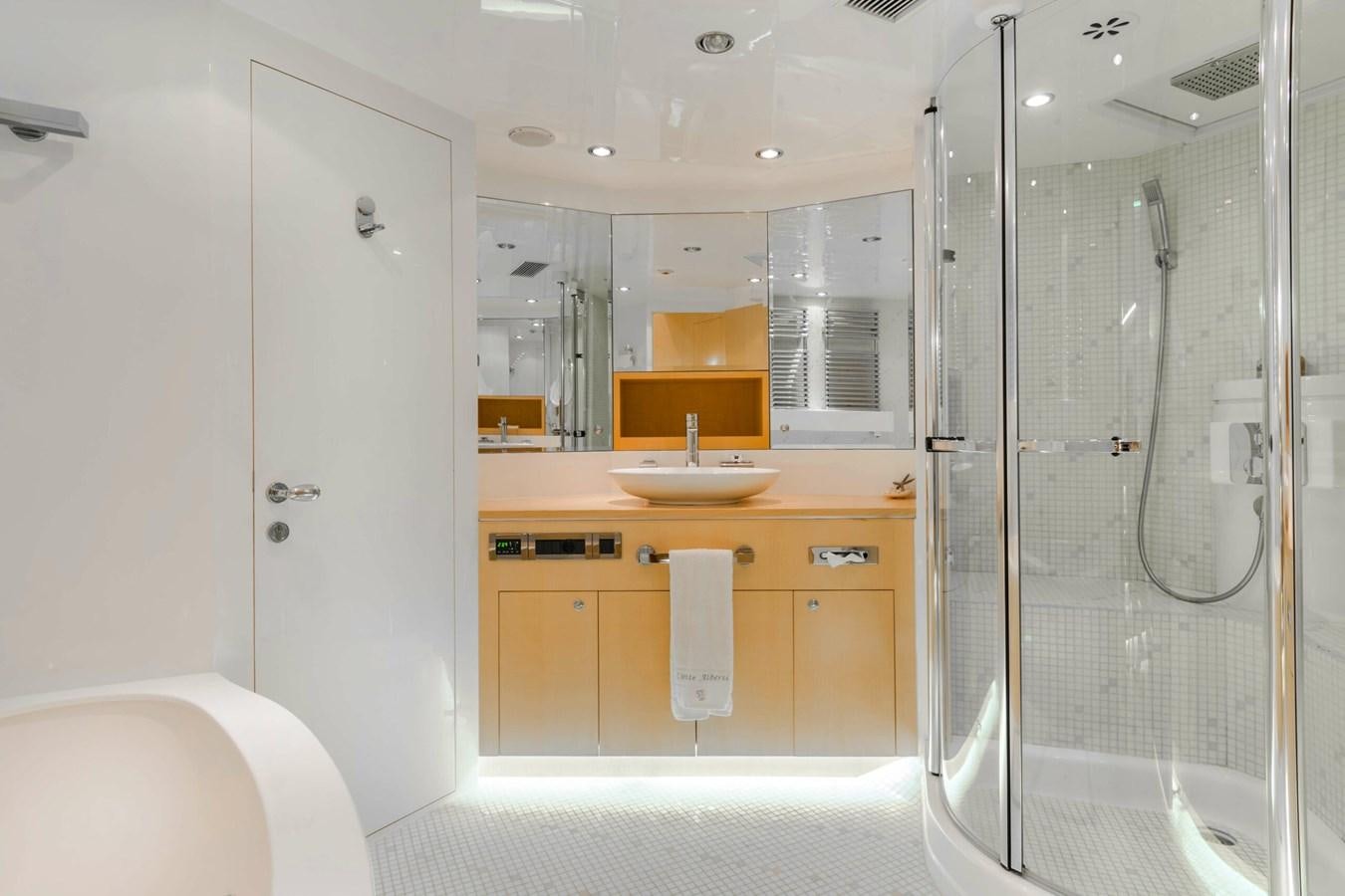 a bathroom with a sink and a shower aboard CONTE ALBERTI Yacht for Sale