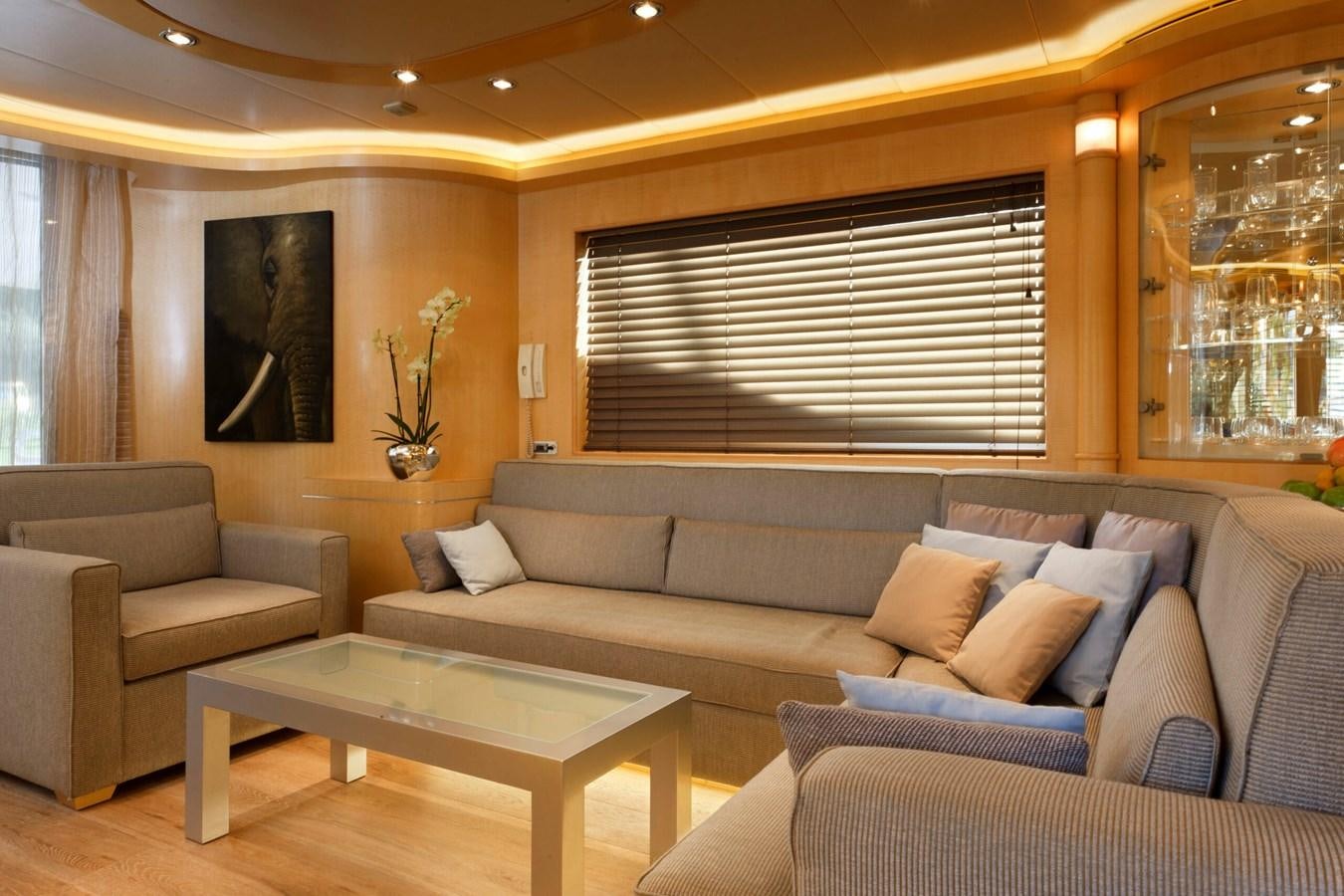 a living room with a couch and a coffee table aboard CONTE ALBERTI Yacht for Sale