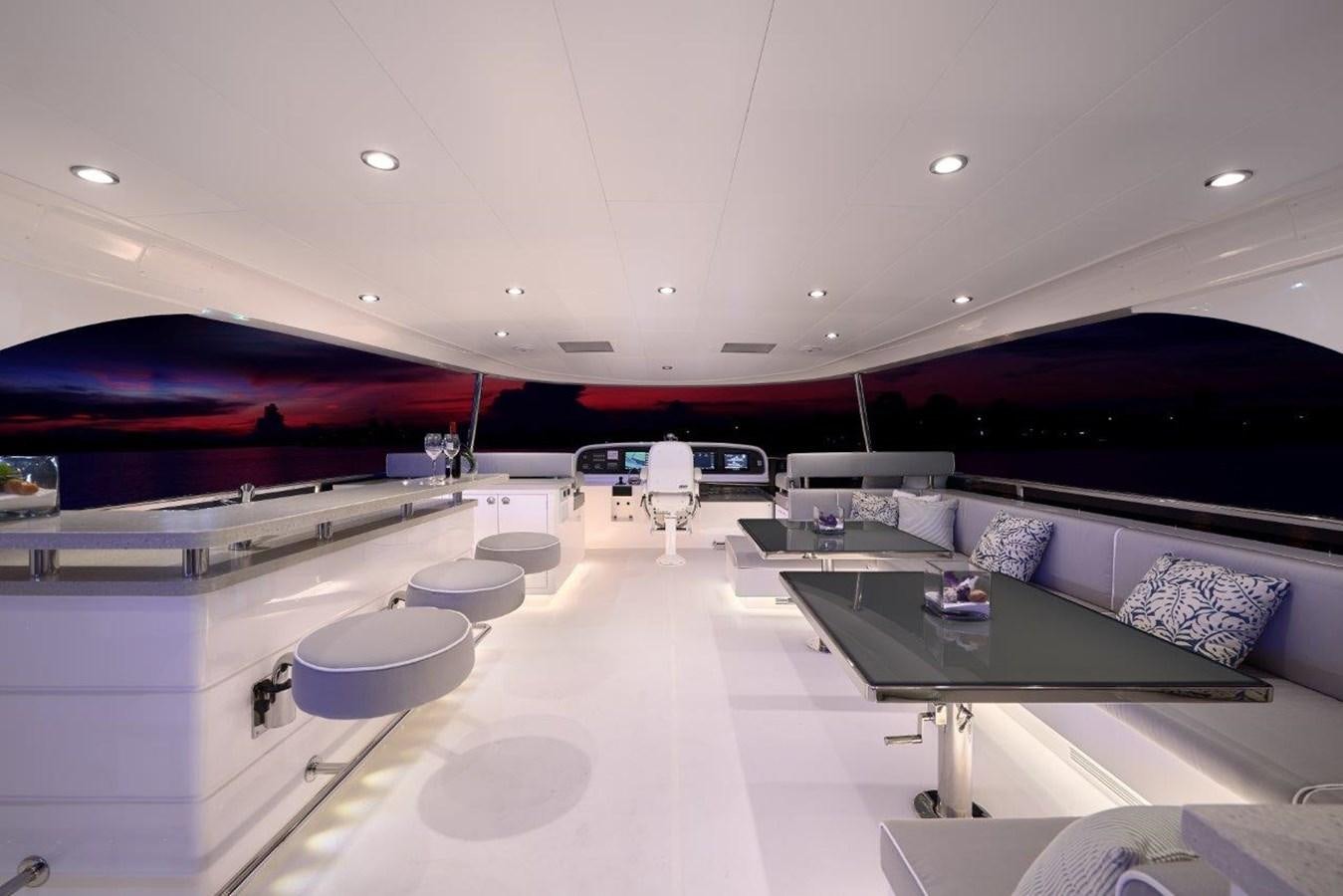 a room with a table and chairs aboard FD90  (NEW BOAT SPEC)  Yacht for Sale