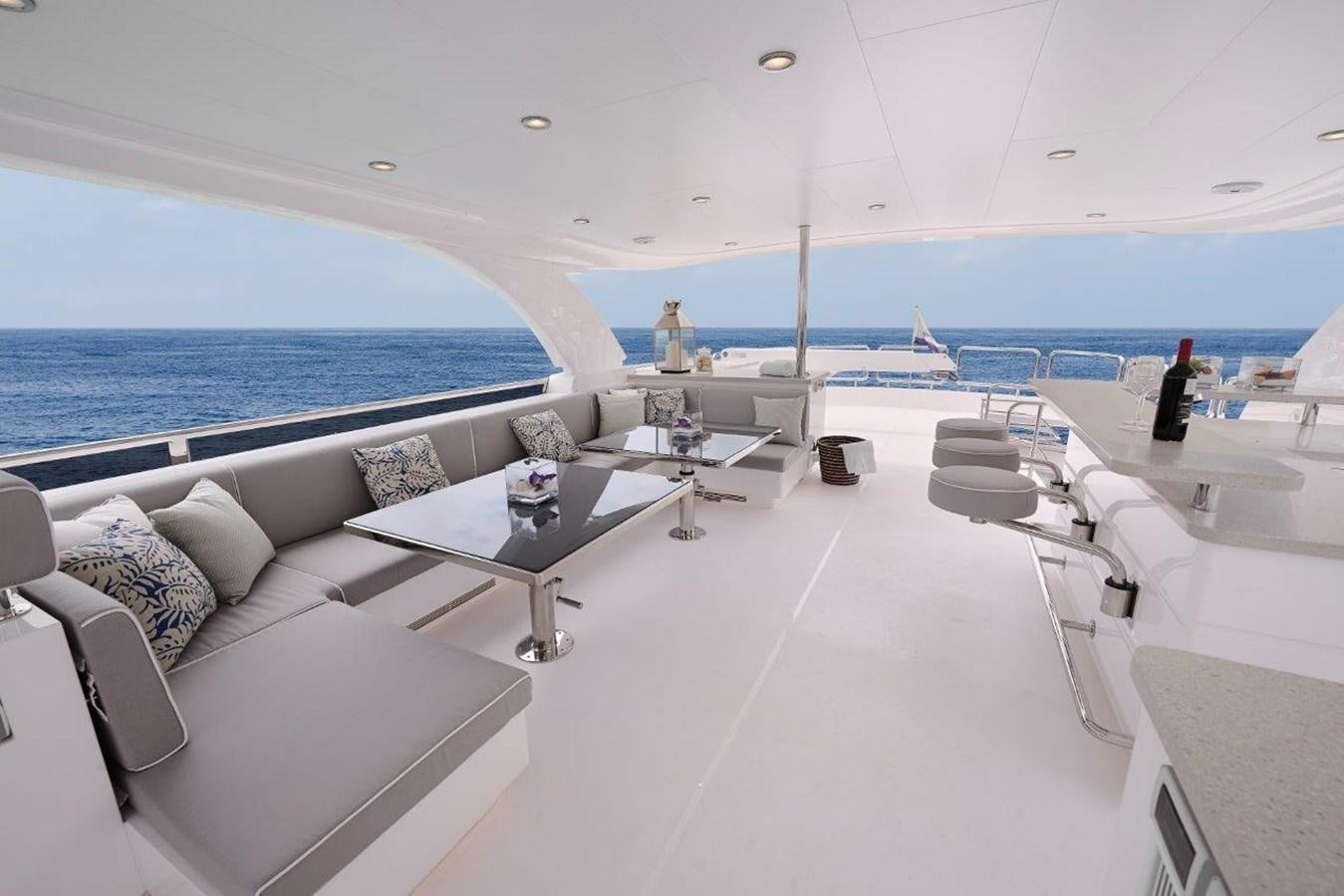 a room with a table and chairs aboard FD90  (NEW BOAT SPEC)  Yacht for Sale