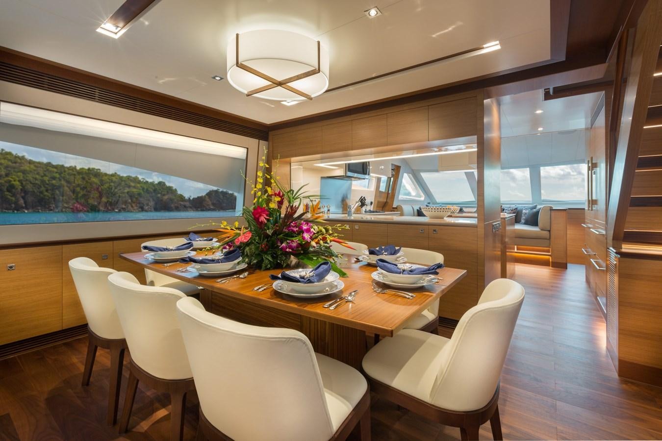 a kitchen with a dining table aboard FD90  (NEW BOAT SPEC)  Yacht for Sale