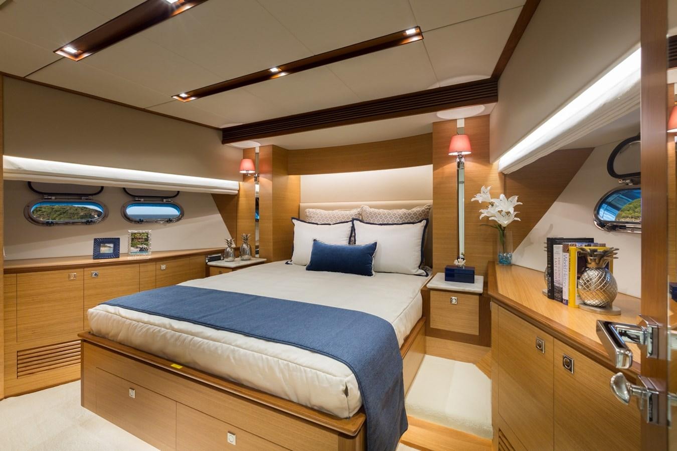 a bedroom with a bed and a desk aboard FD90  (NEW BOAT SPEC)  Yacht for Sale