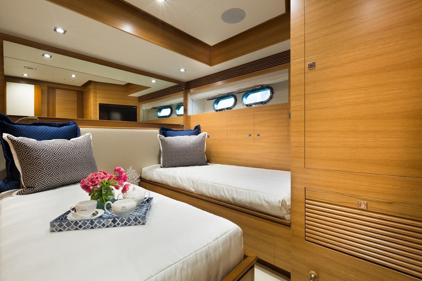 a room with a bed and a table aboard FD90  (NEW BOAT SPEC)  Yacht for Sale