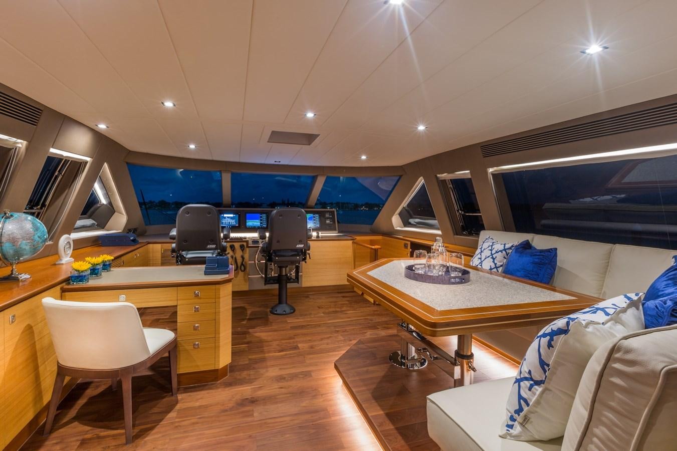 a room with a table and chairs aboard FD90  (NEW BOAT SPEC)  Yacht for Sale