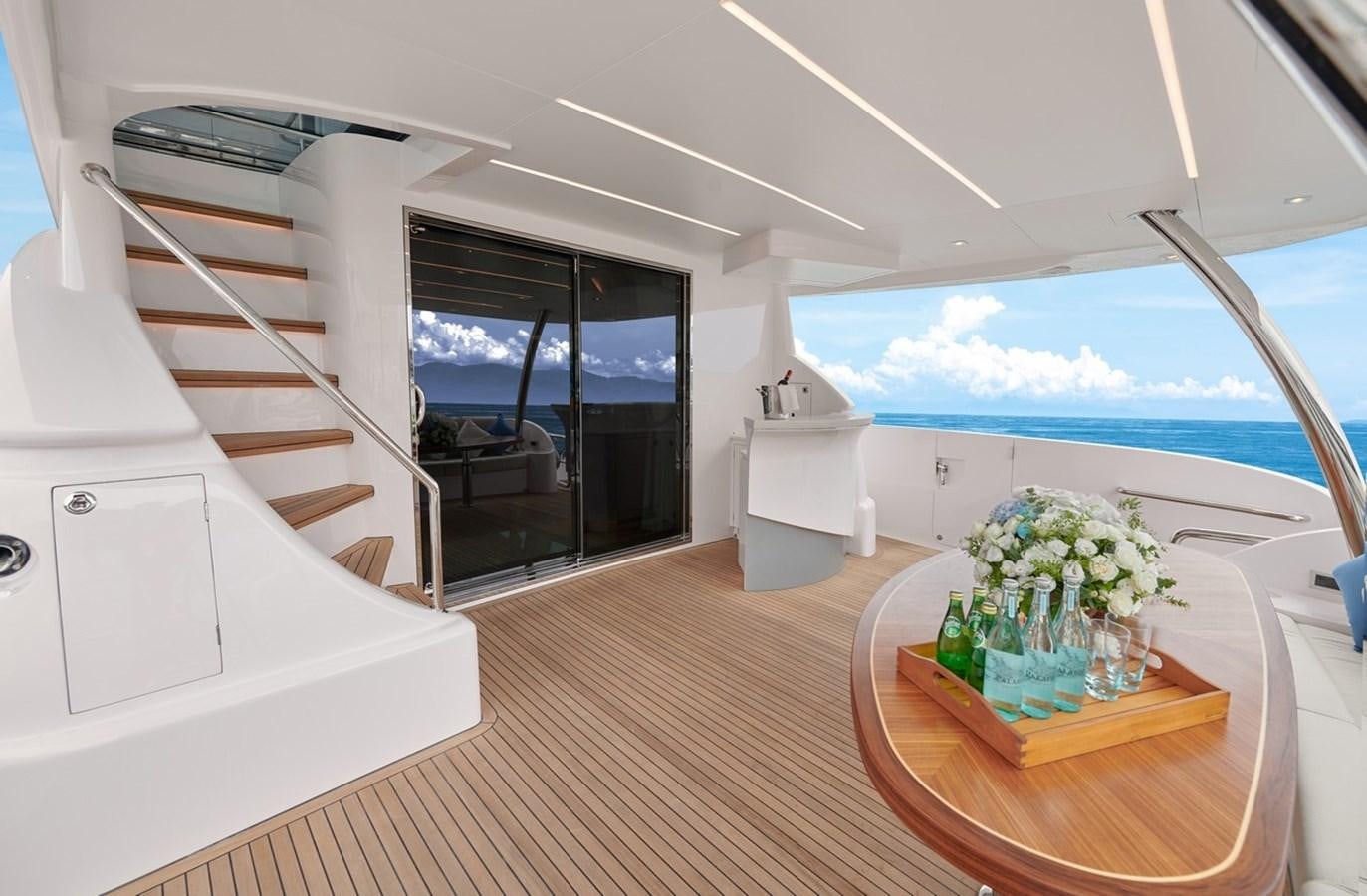a room with a table and chairs aboard FD90  (NEW BOAT SPEC)  Yacht for Sale