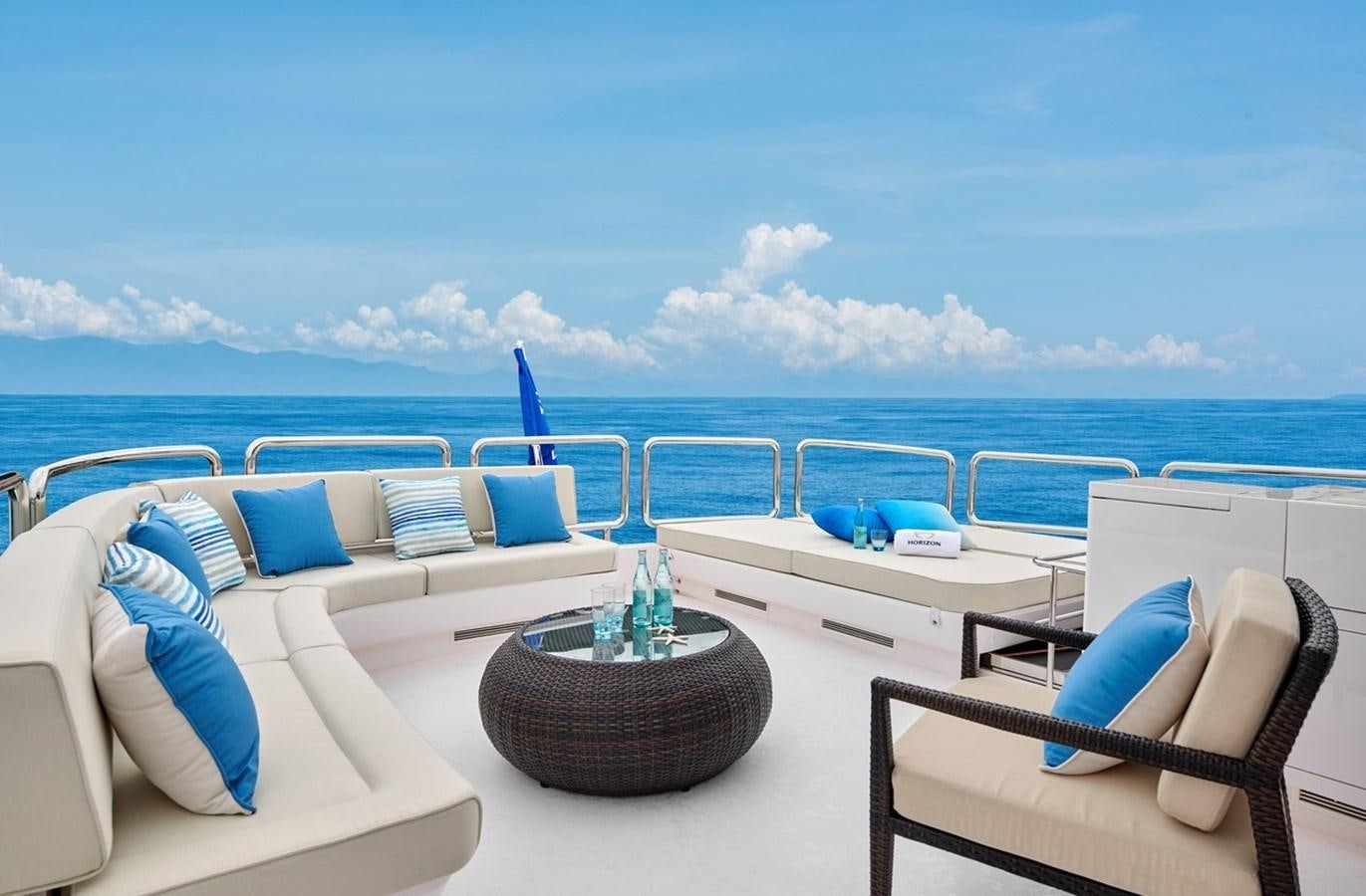 a room with a table chairs and a view of the ocean aboard FD90  (NEW BOAT SPEC)  Yacht for Sale