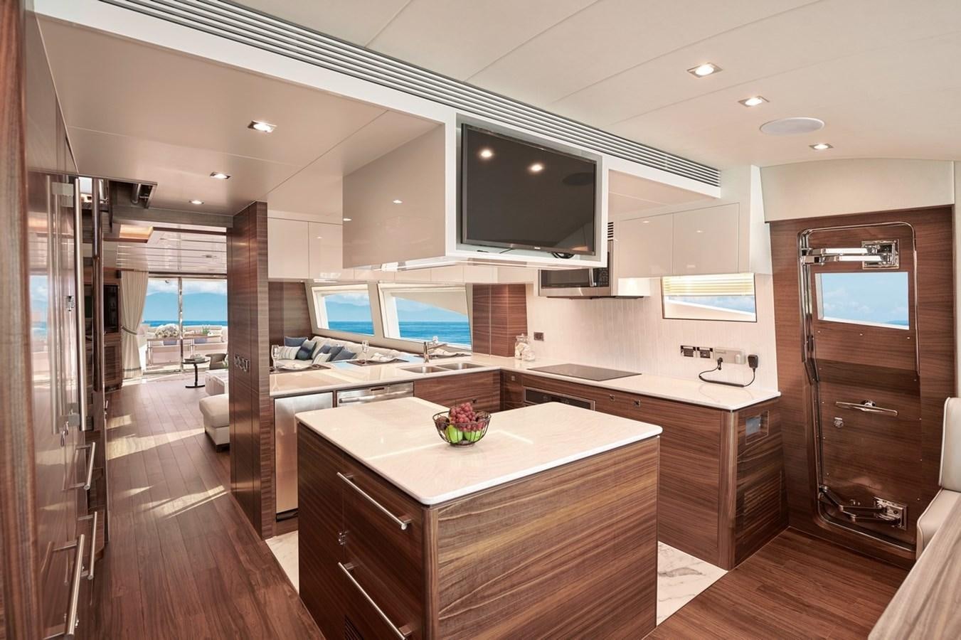 a kitchen with a large island aboard FD90  (NEW BOAT SPEC)  Yacht for Sale