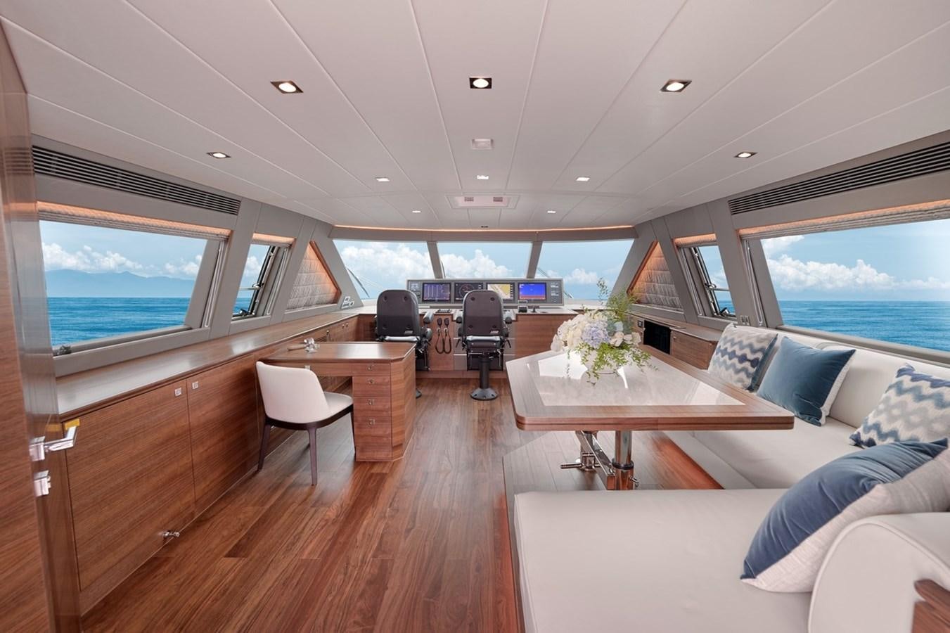 a room with a table and chairs aboard FD90  (NEW BOAT SPEC)  Yacht for Sale
