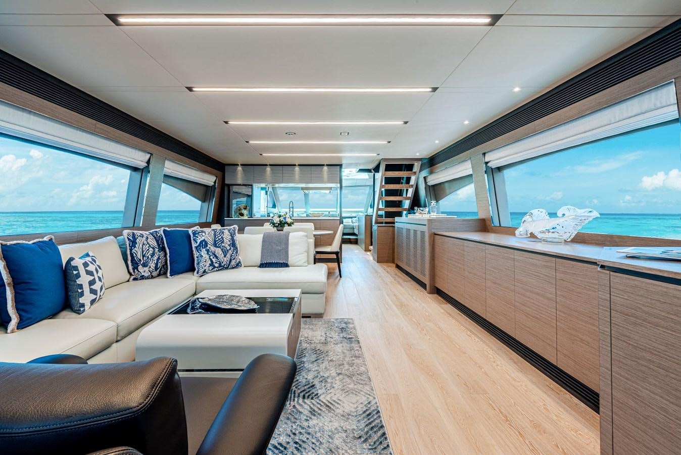 a large living room with a large window aboard FD90  (NEW BOAT SPEC)  Yacht for Sale
