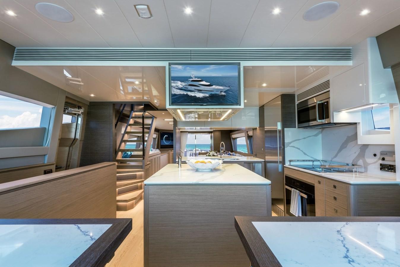 a modern kitchen with a large screen aboard FD90  (NEW BOAT SPEC)  Yacht for Sale