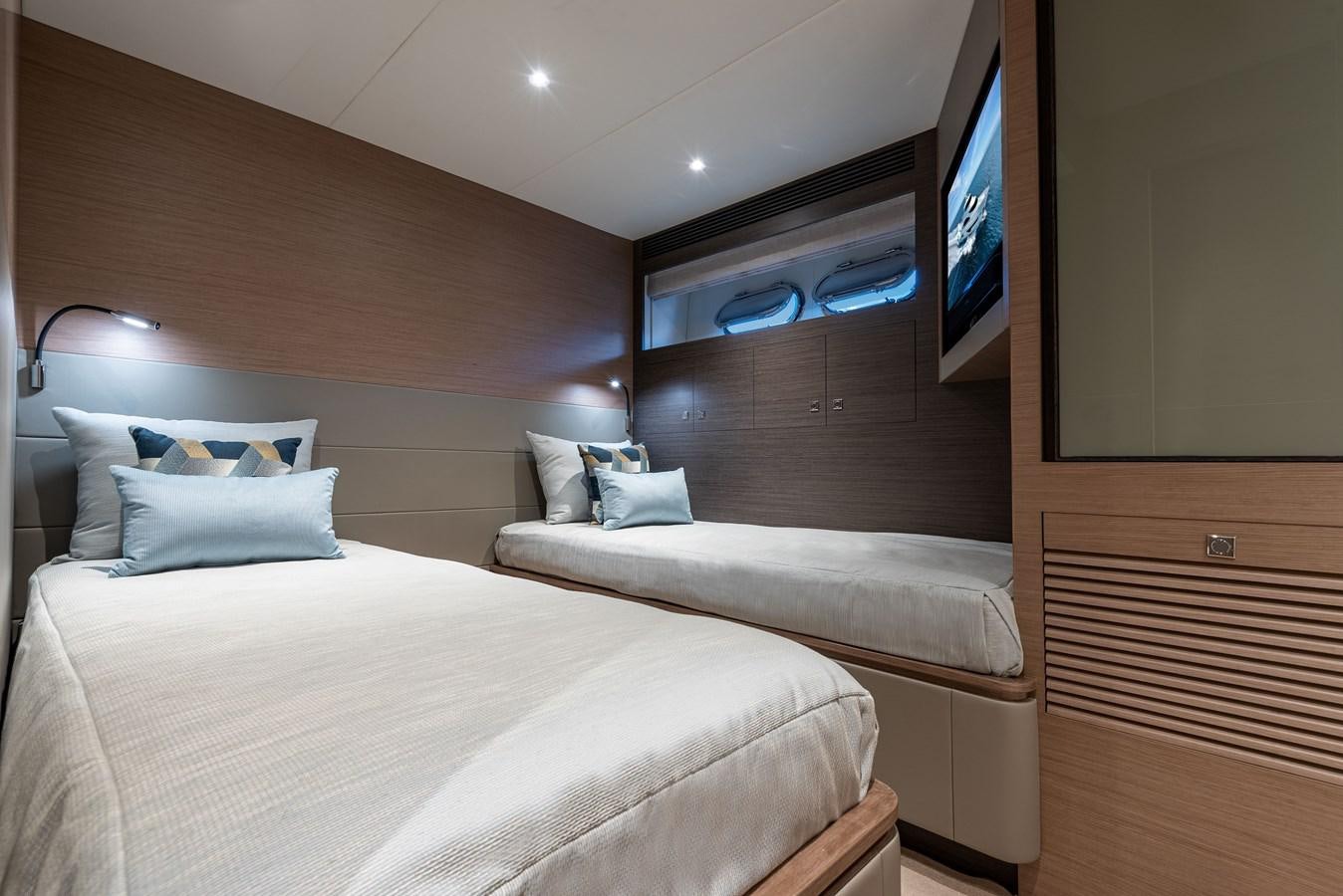 a room with a bed and a television aboard FD90  (NEW BOAT SPEC)  Yacht for Sale