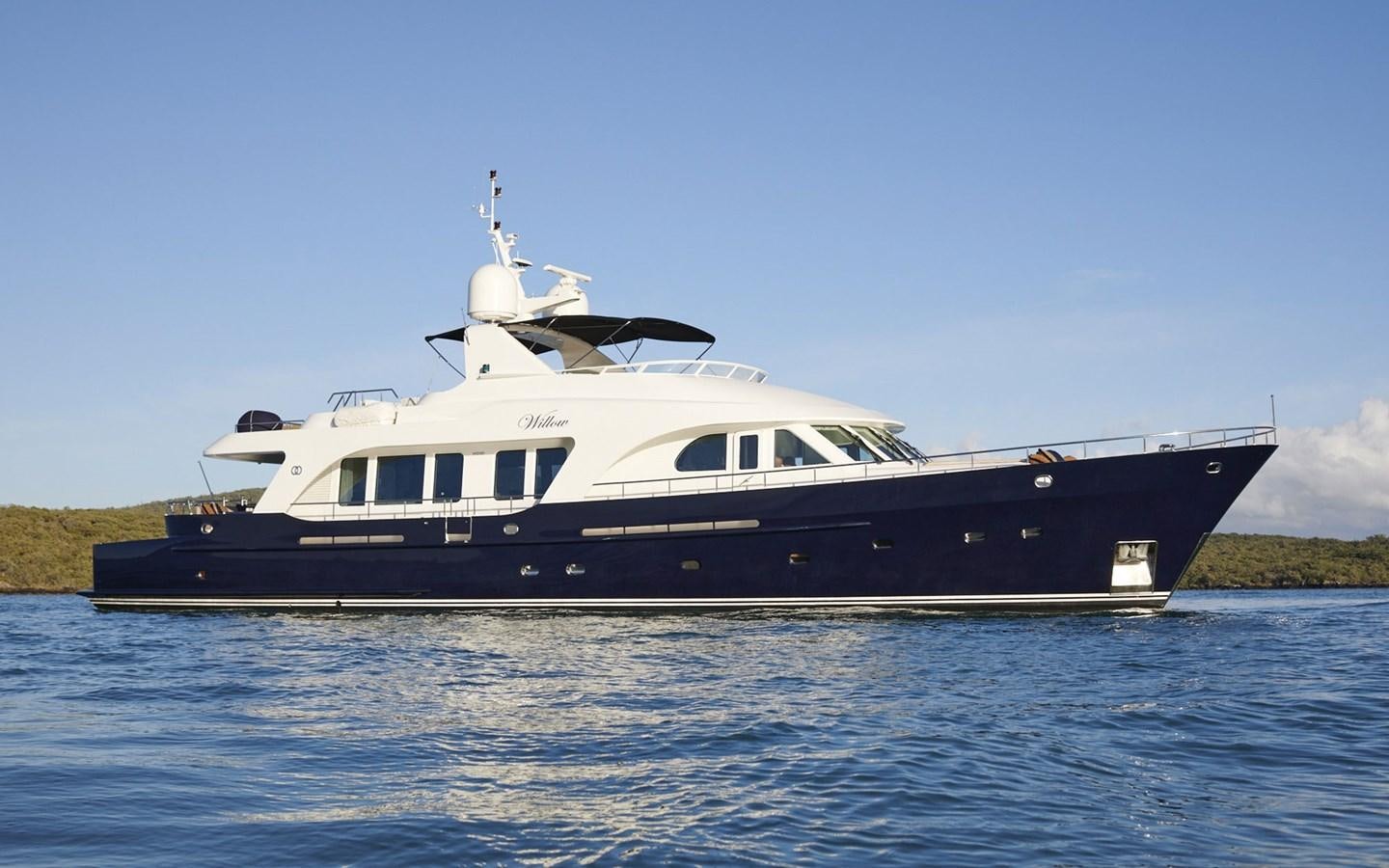 a large boat on the water aboard WILLOW Yacht for Sale