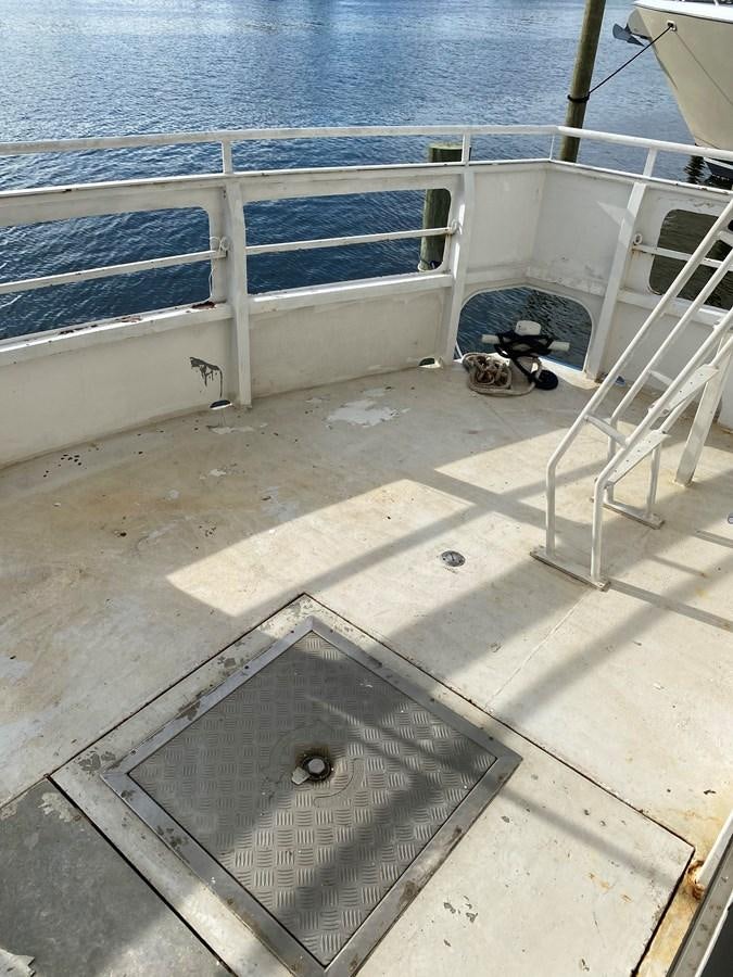 a broken window on a boat aboard THE OASIS Yacht for Sale
