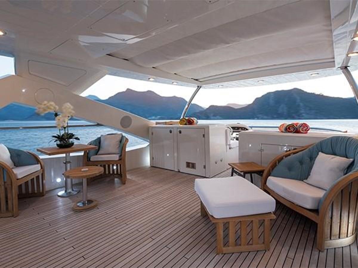 a room with a couch and a table and a bed aboard UNIQUE NAZ Yacht for Sale