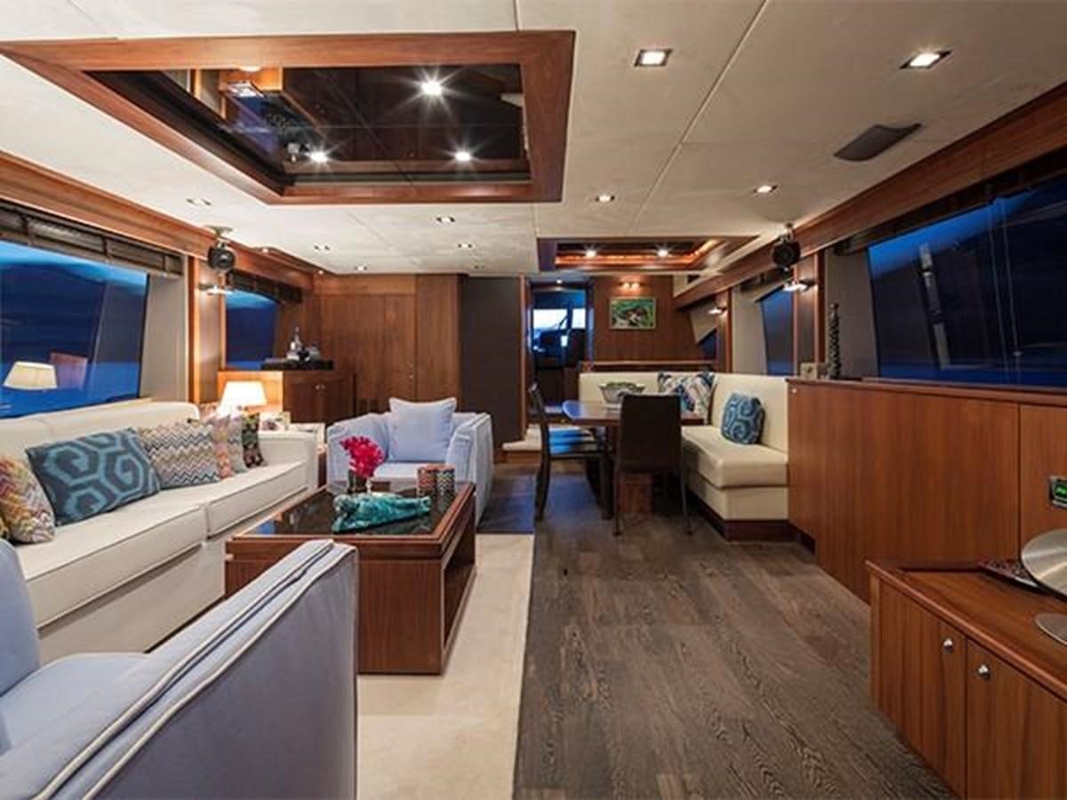 a living room with a wood floor aboard UNIQUE NAZ Yacht for Sale