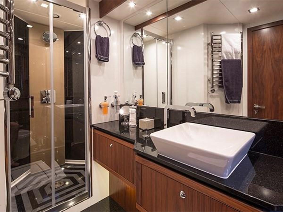 a bathroom with a large mirror aboard UNIQUE NAZ Yacht for Sale