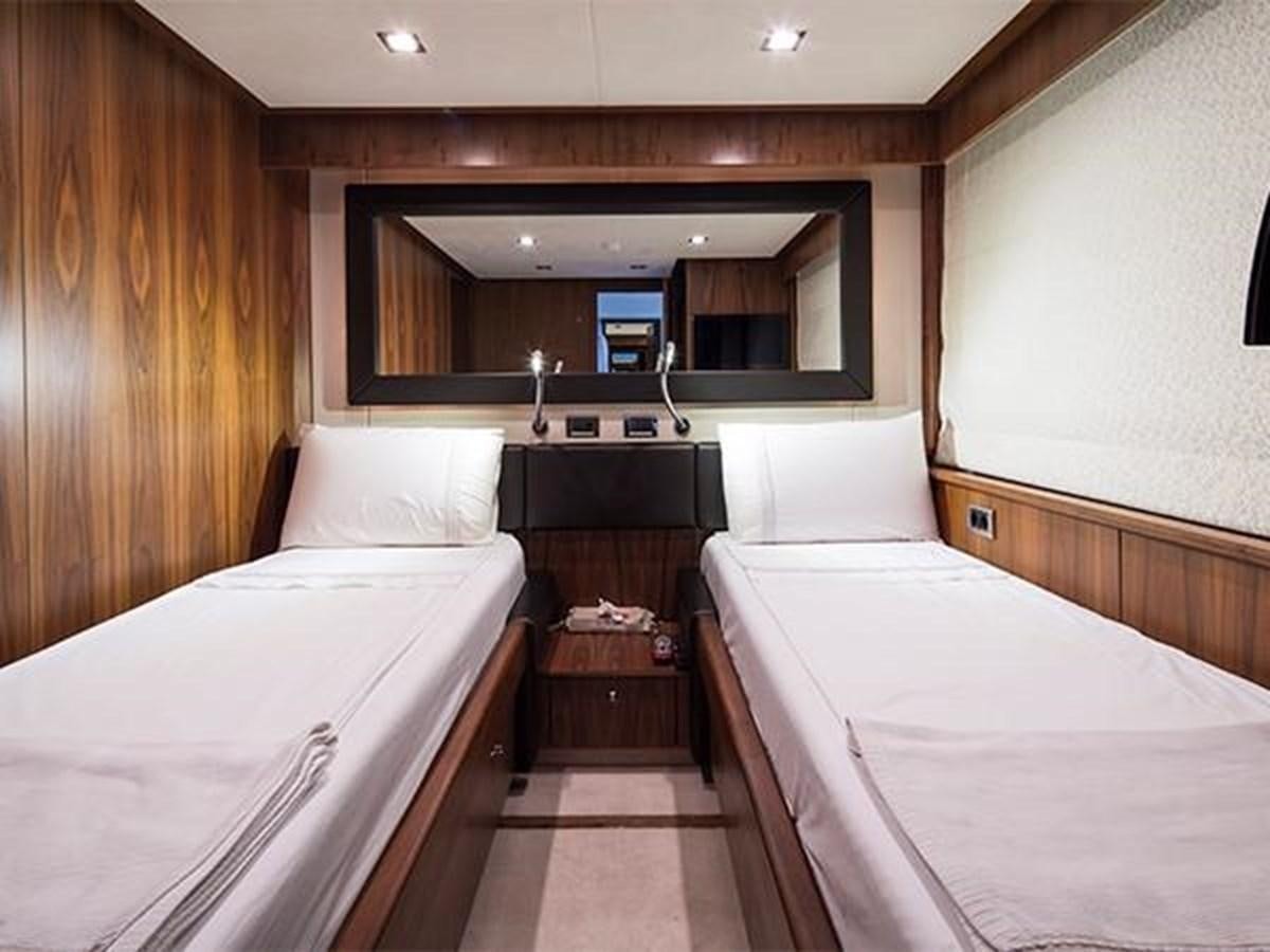 a room with two beds aboard UNIQUE NAZ Yacht for Sale