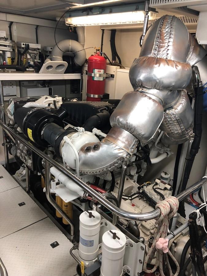 a large metal machine aboard NEW OCEAN 88 Yacht for Sale