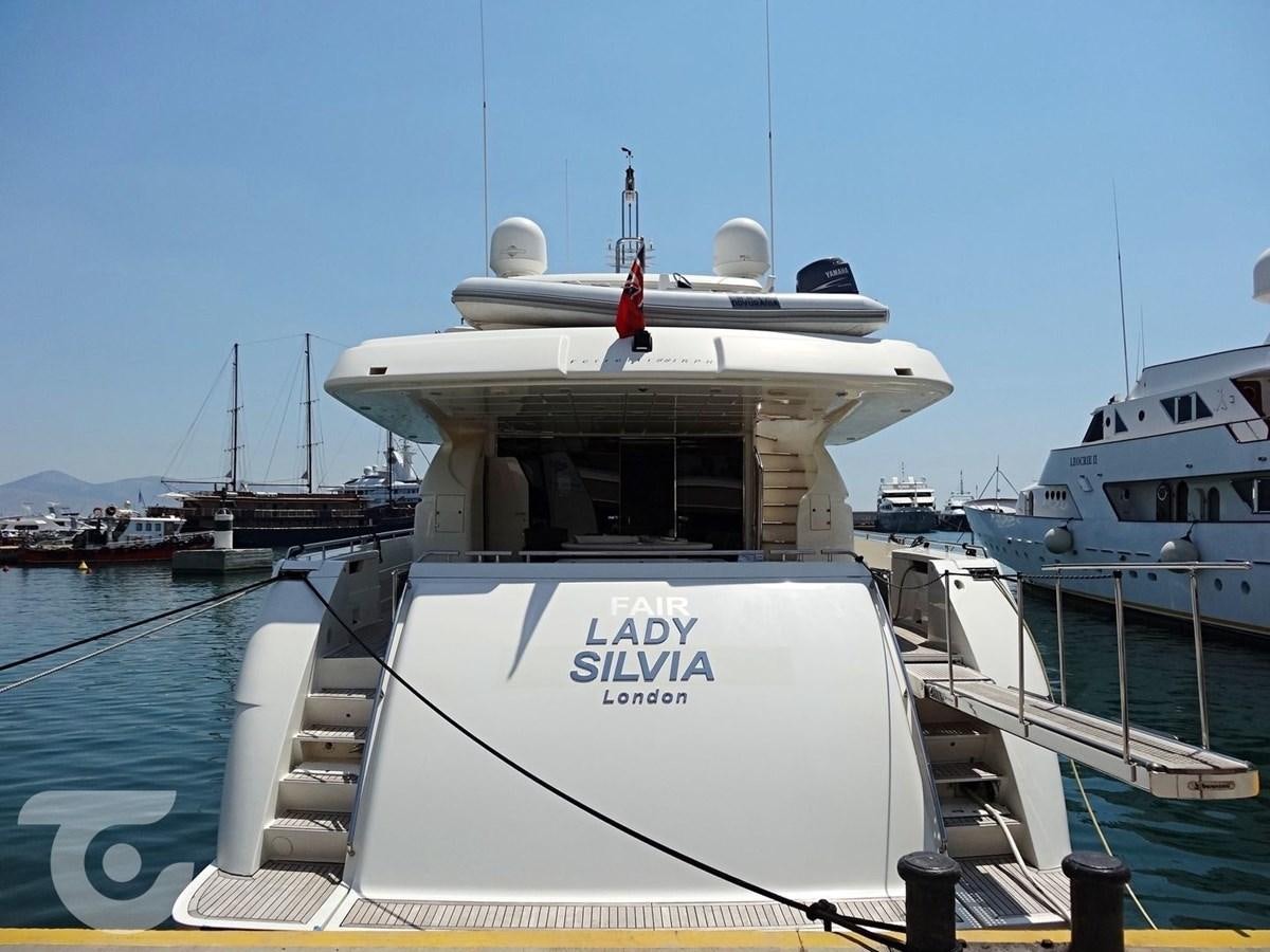 a boat docked at a pier aboard FAIR LADY SILVIA Yacht for Sale
