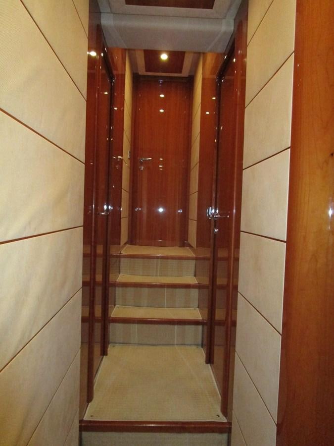 a door with a glass window aboard NACL Yacht for Sale