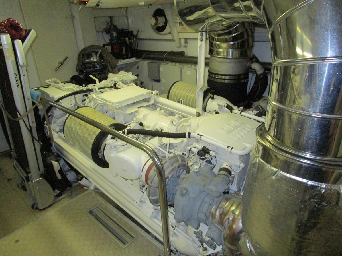 a large machine with a large metal cylinder aboard NACL Yacht for Sale