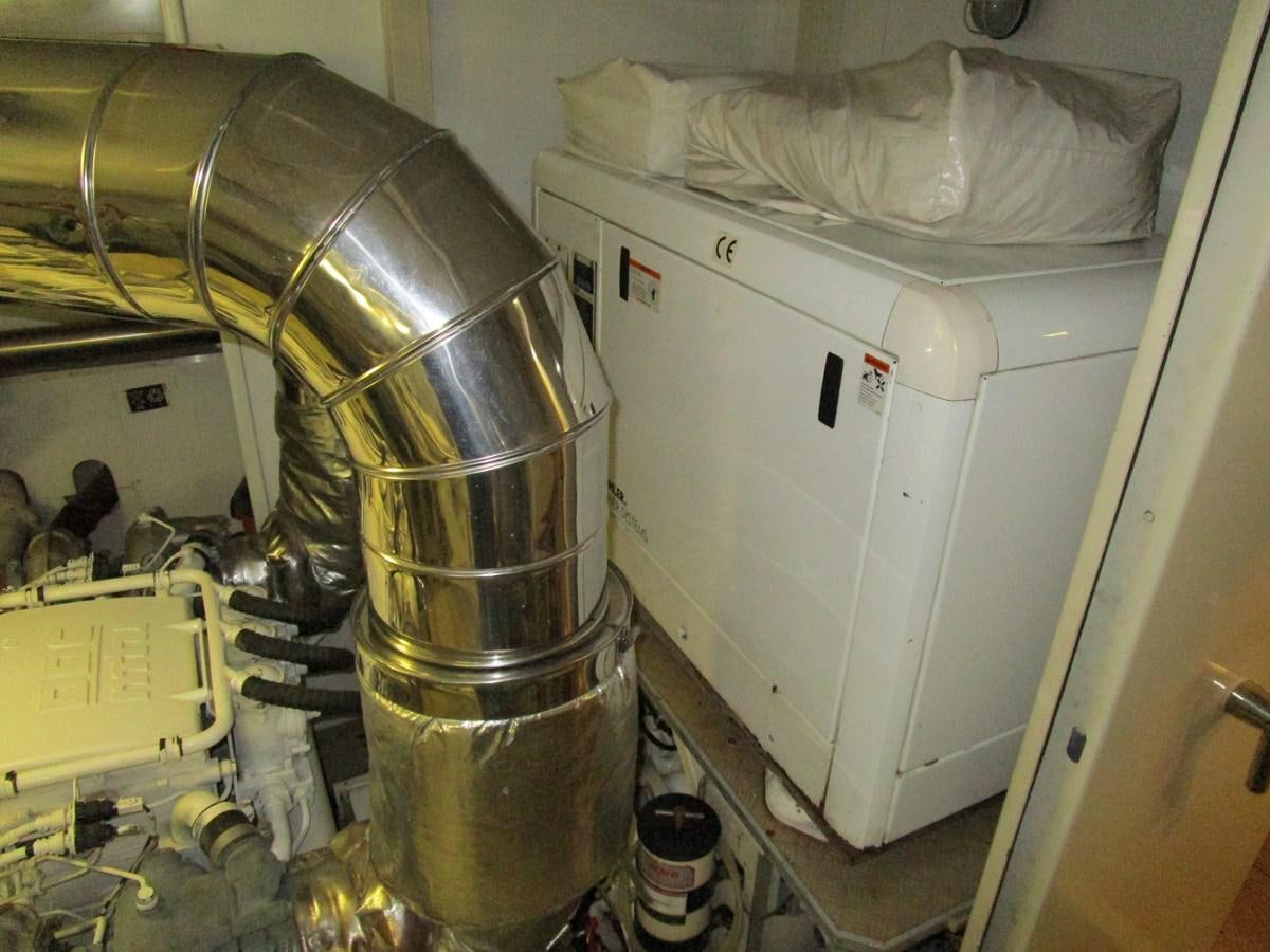 a large metal machine aboard NACL Yacht for Sale