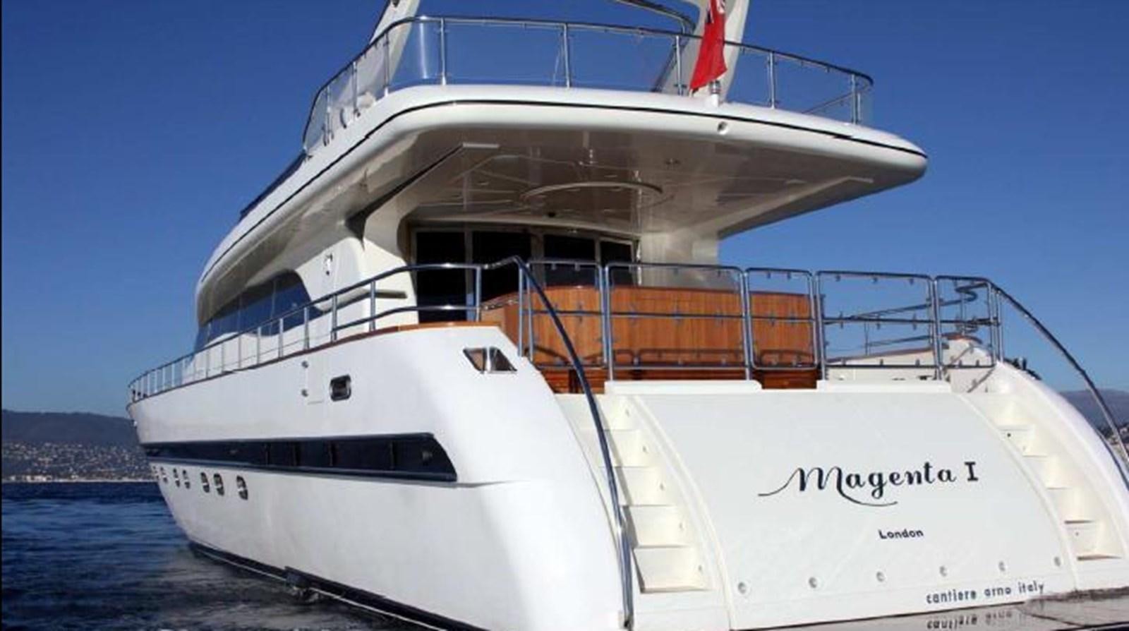 a white yacht on the water aboard MAGENTA I Yacht for Sale