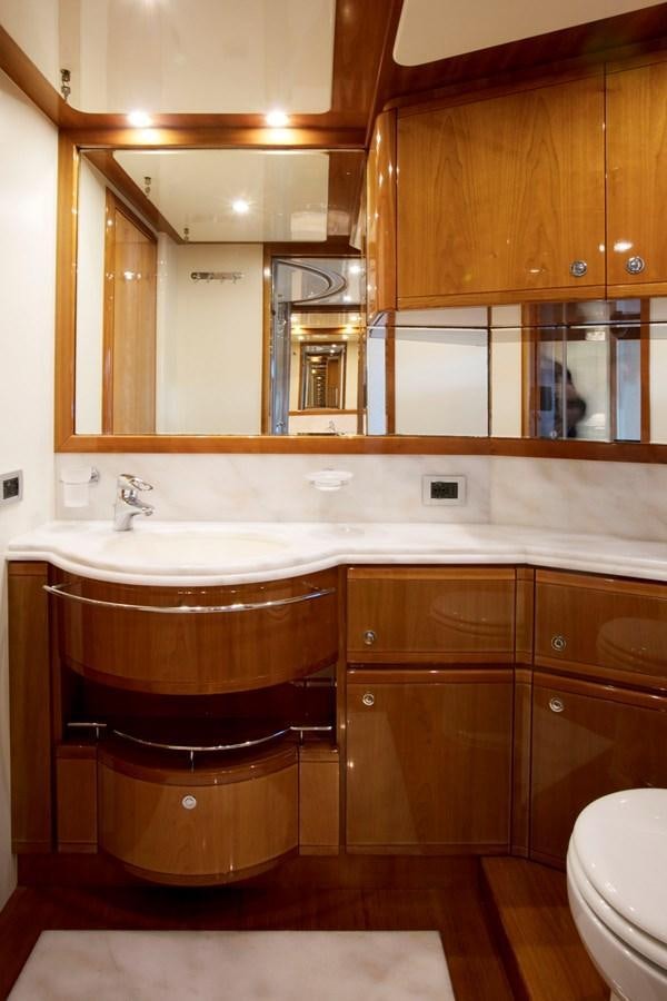 a bathroom with a large mirror aboard LADY VICTORIA Yacht for Sale