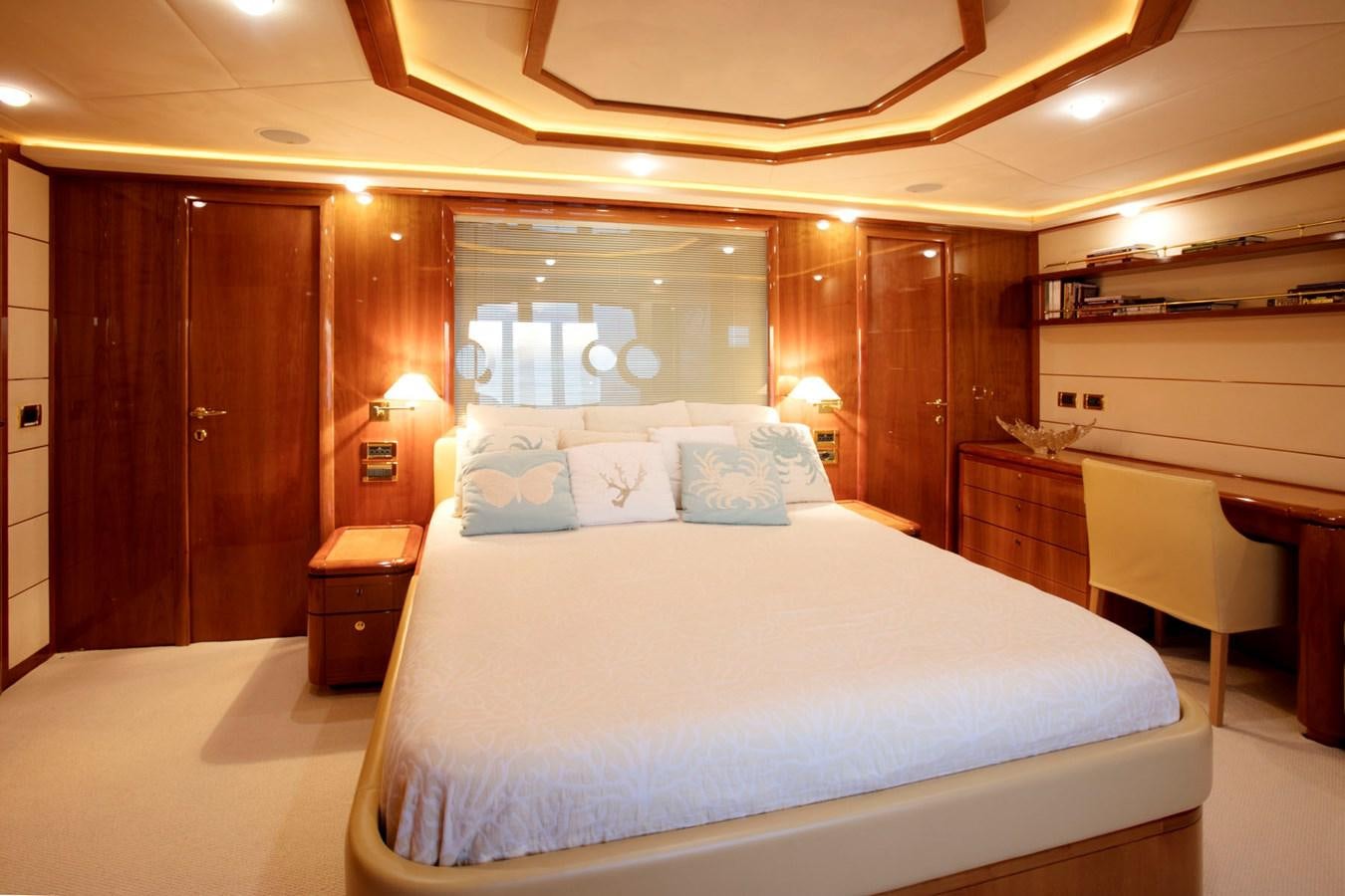 a bed in a hotel room aboard LADY VICTORIA Yacht for Sale