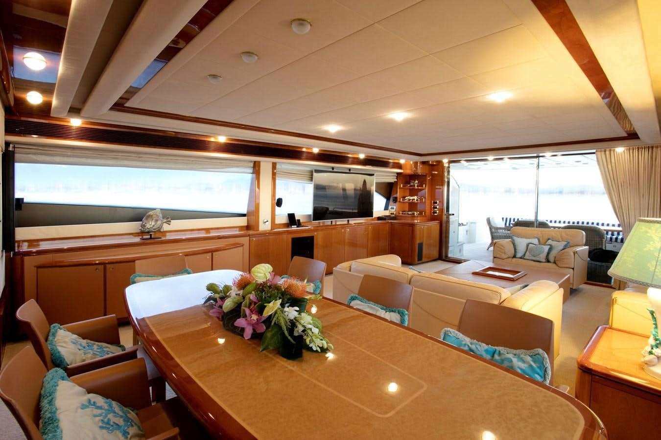 a living room with a large window aboard LADY VICTORIA Yacht for Sale