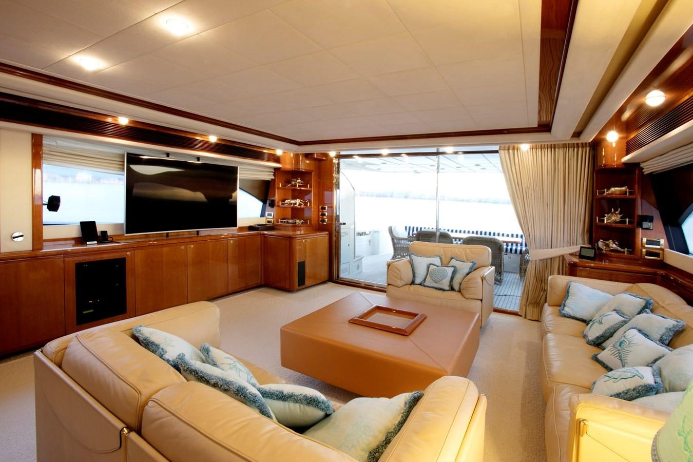 a living room with a large window aboard LADY VICTORIA Yacht for Sale