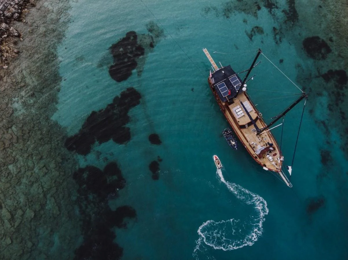 a boat in the water aboard CAPRICORN 1 Yacht for Sale
