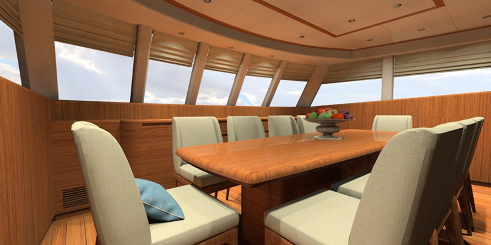 a room with chairs and a table aboard NAVETTA 656 Yacht for Sale