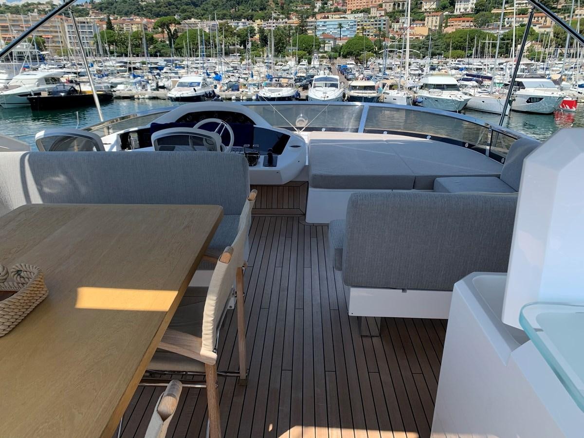a deck with boats in it aboard KAPUSHA Yacht for Sale