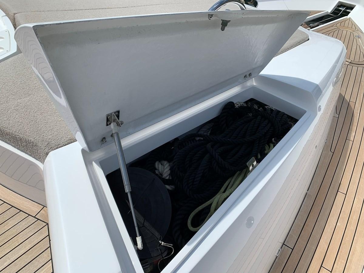 a white sink with a black object in it aboard KAPUSHA Yacht for Sale
