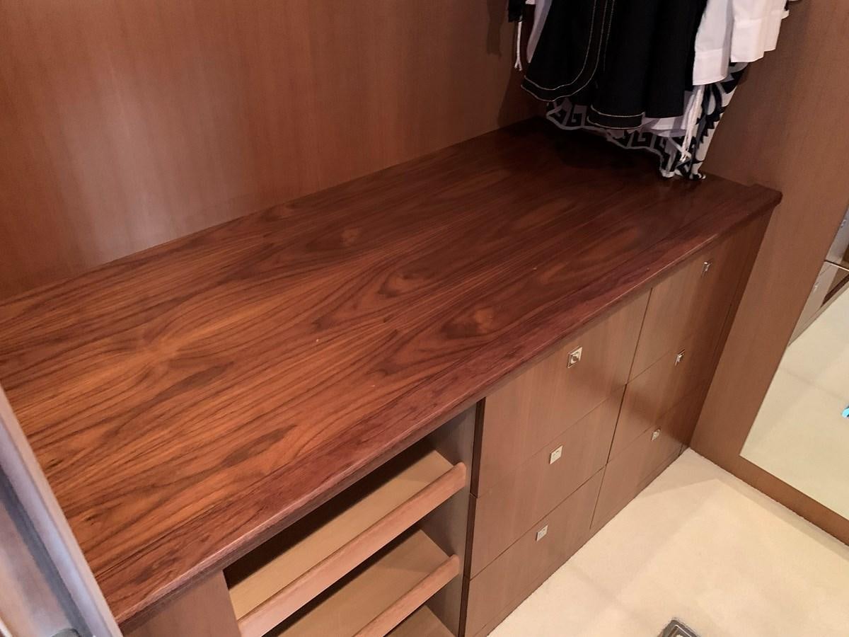 a wooden shelf with a white towel aboard KAPUSHA Yacht for Sale