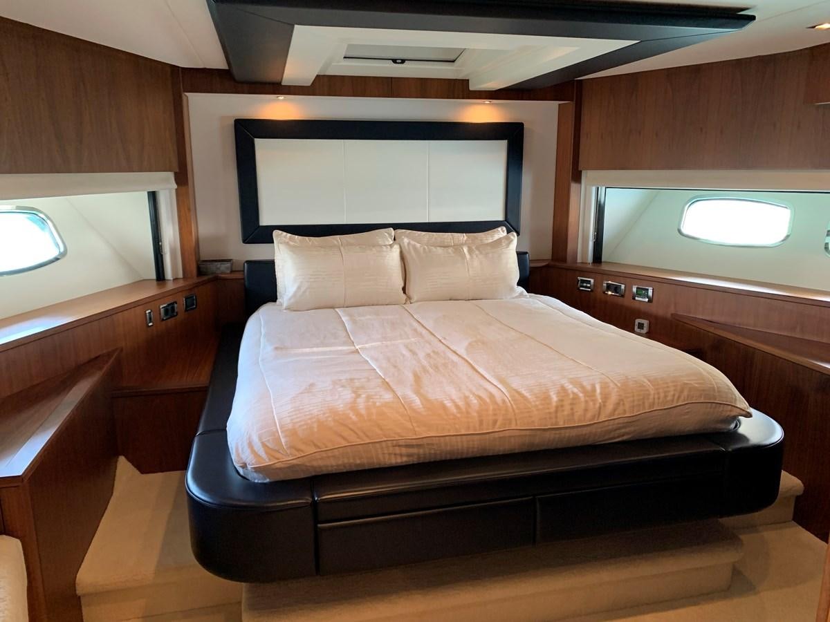 a bed in a room aboard KAPUSHA Yacht for Sale