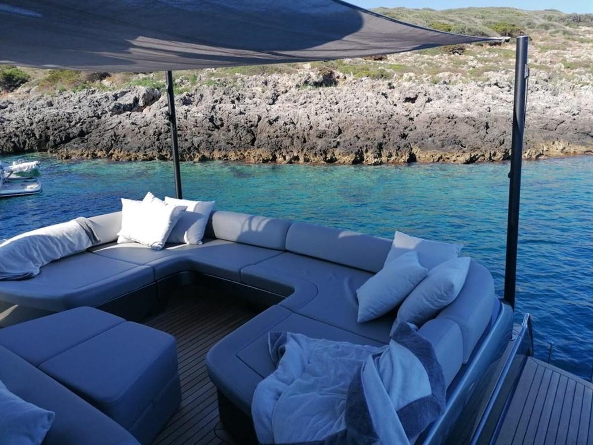 a pool with a view of a mountain and a lake aboard FIRST SIGNS Yacht for Sale