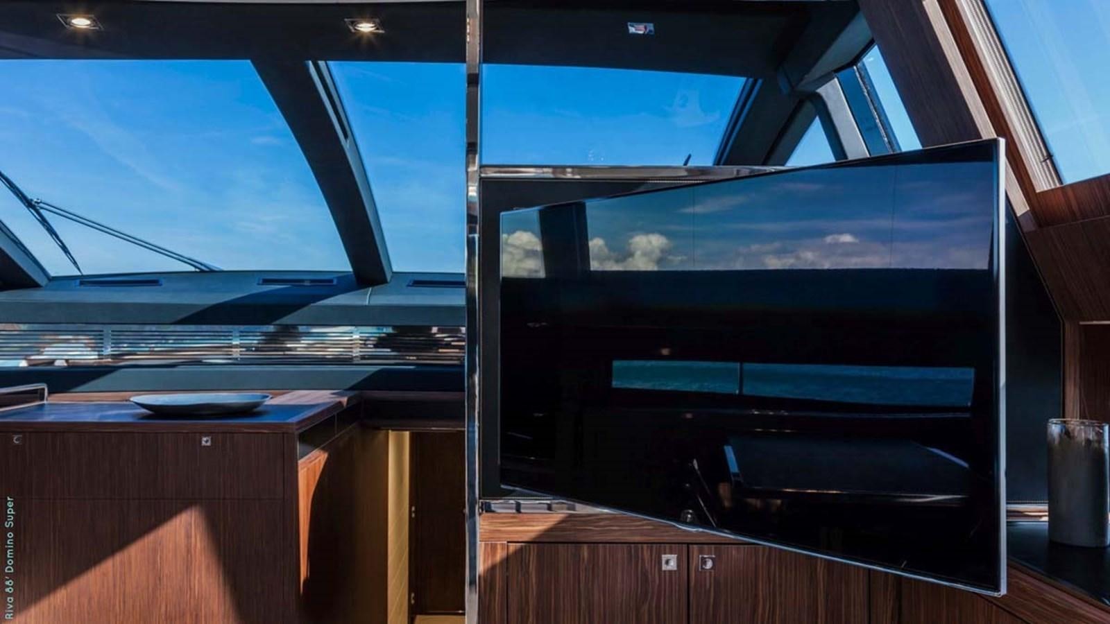 a room with a large window aboard FIRST SIGNS Yacht for Sale