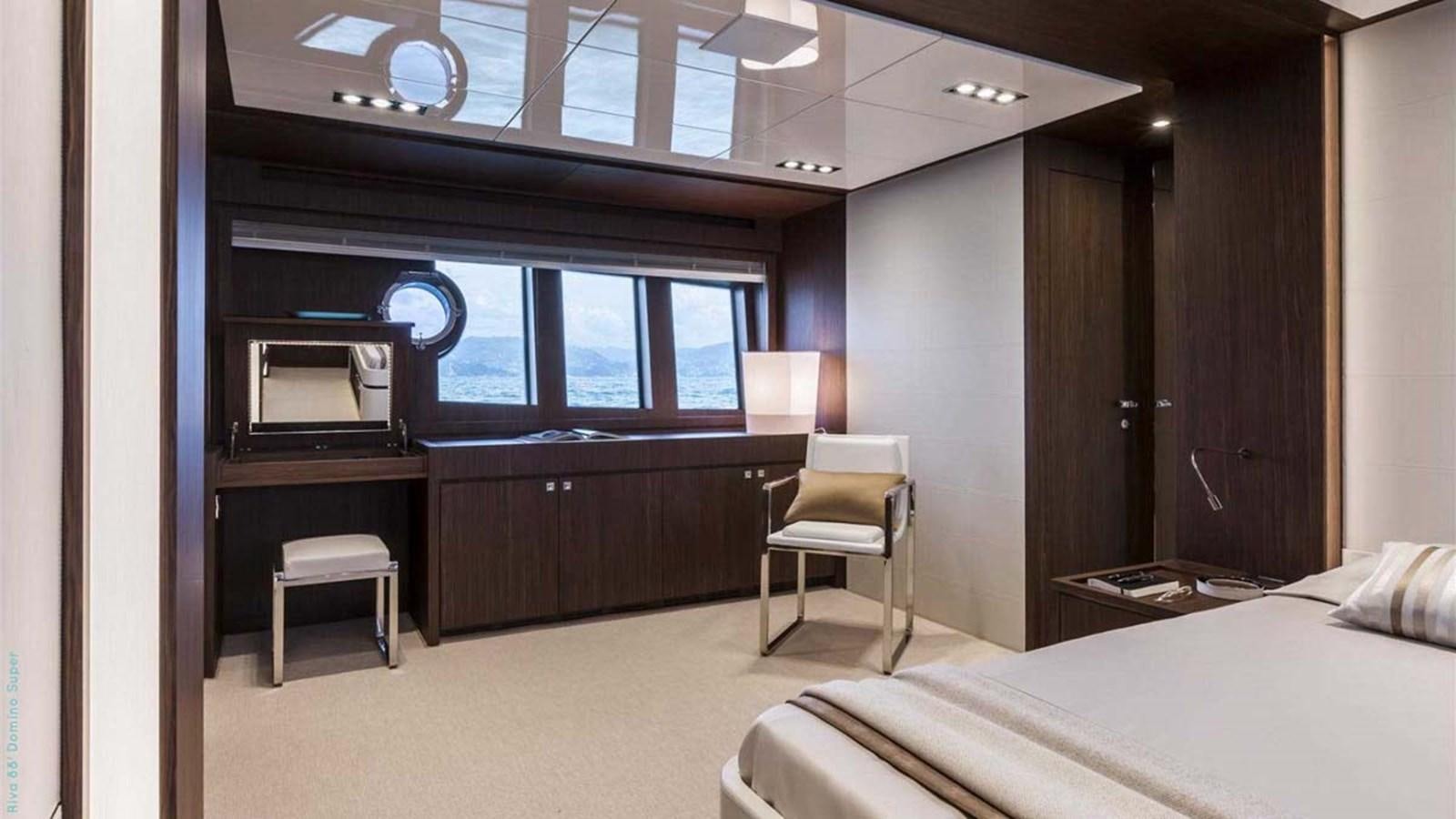 a room with a bed and a desk aboard FIRST SIGNS Yacht for Sale