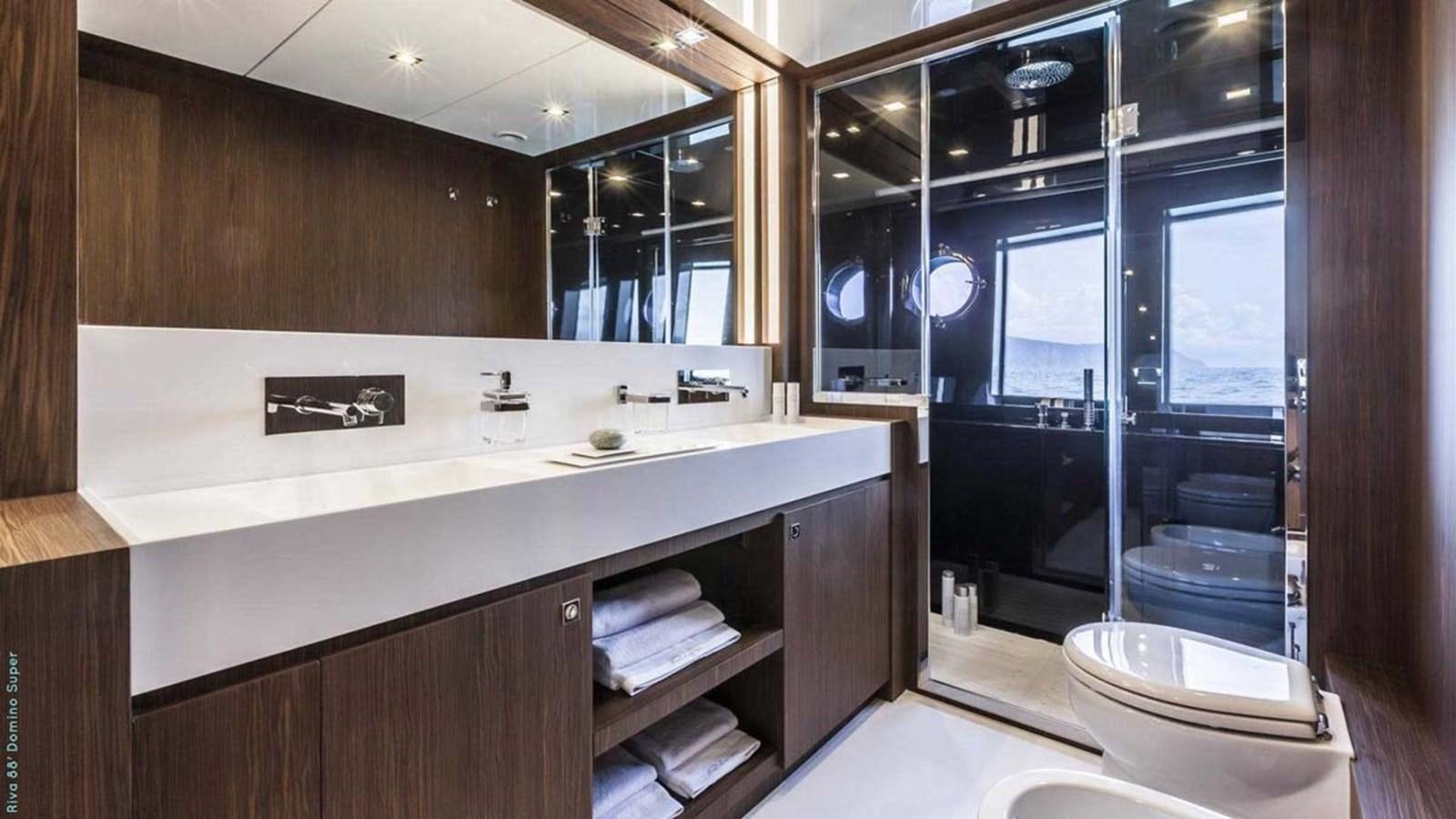 a bathroom with a large mirror aboard FIRST SIGNS Yacht for Sale