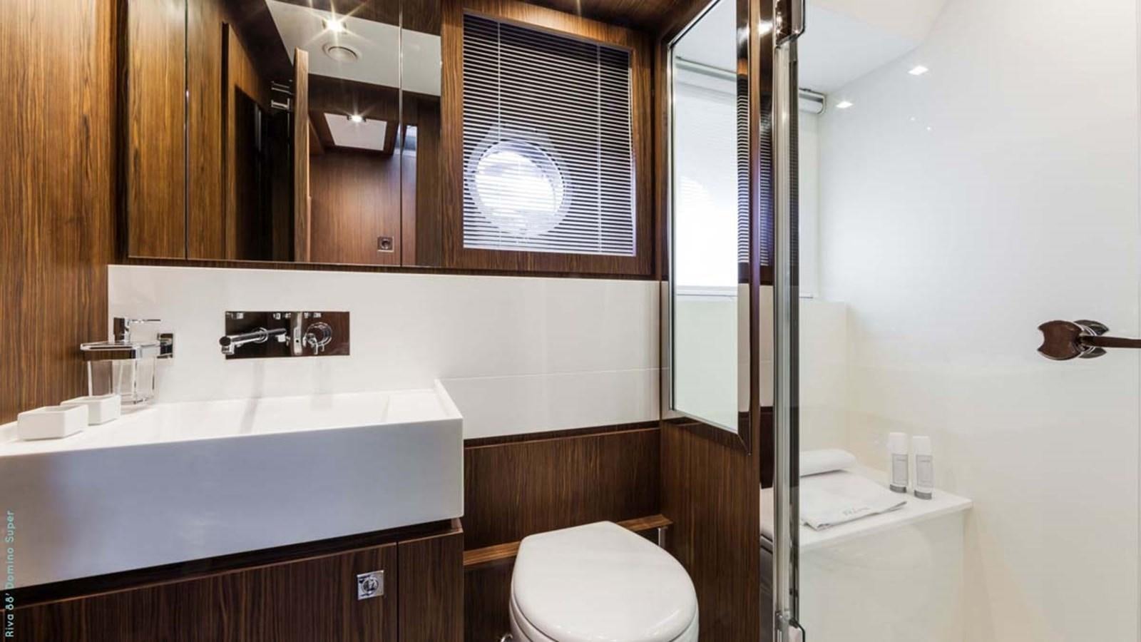 a bathroom with a sink and a toilet aboard FIRST SIGNS Yacht for Sale