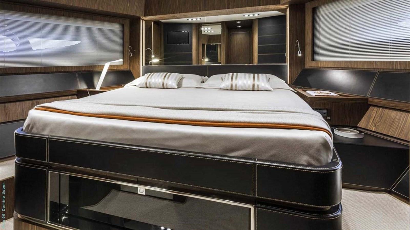 a bed in a room aboard FIRST SIGNS Yacht for Sale