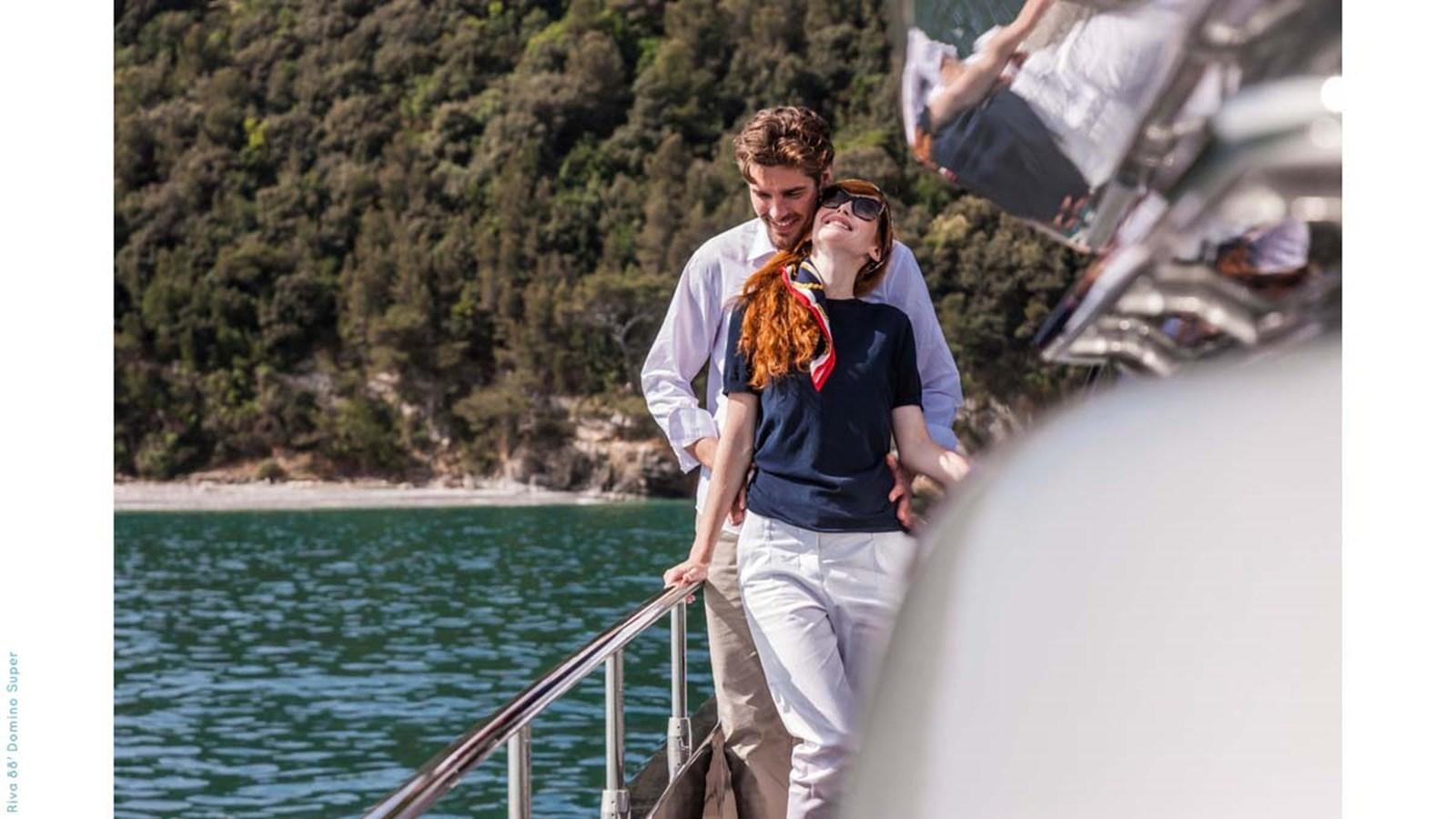 a man and woman on a boat aboard FIRST SIGNS Yacht for Sale