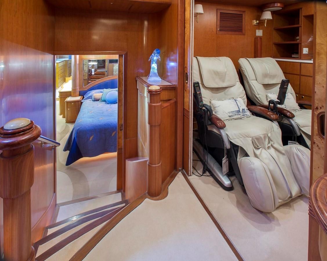 a bedroom with a mirror aboard SILVER WINGS Yacht for Sale