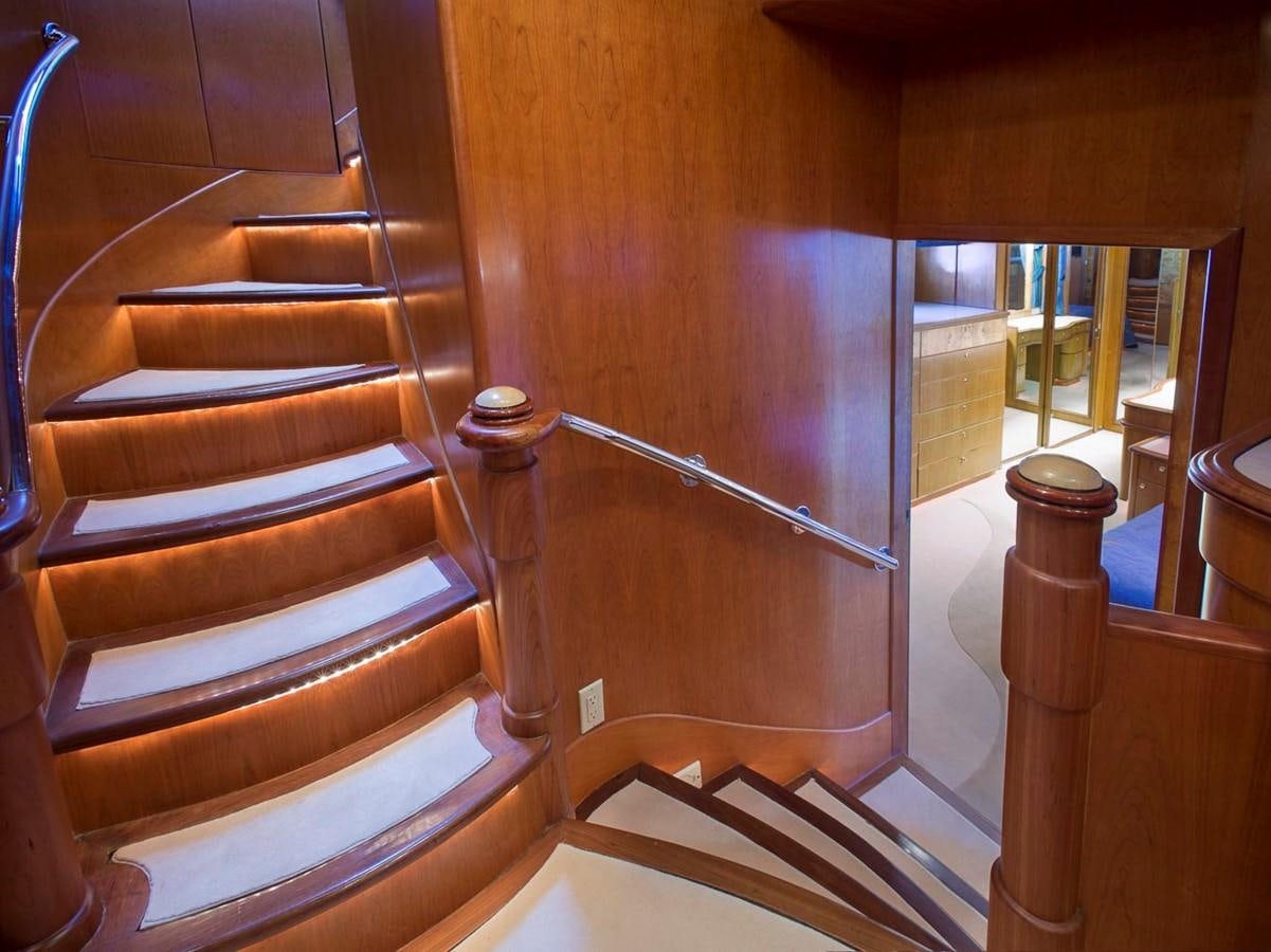 a staircase with a railing aboard SILVER WINGS Yacht for Sale