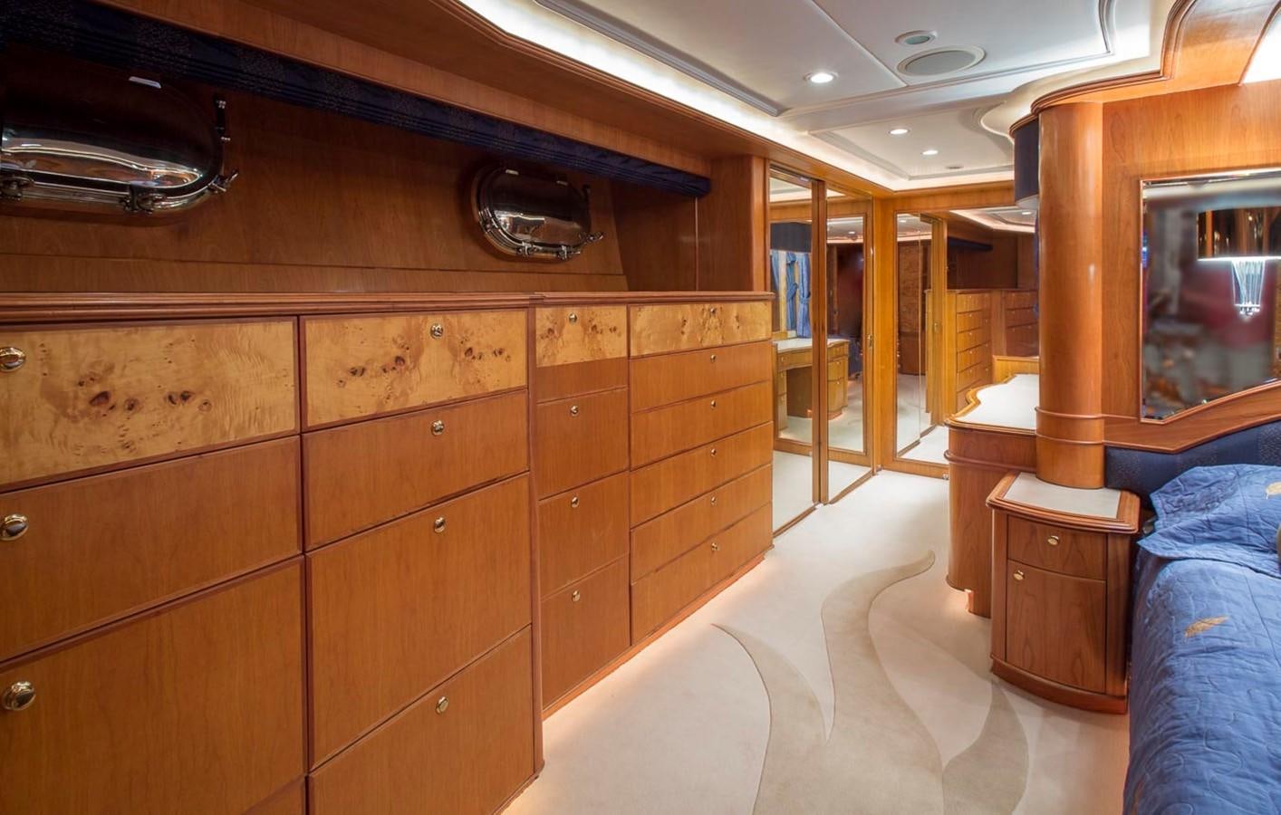 a room with wooden furniture aboard SILVER WINGS Yacht for Sale