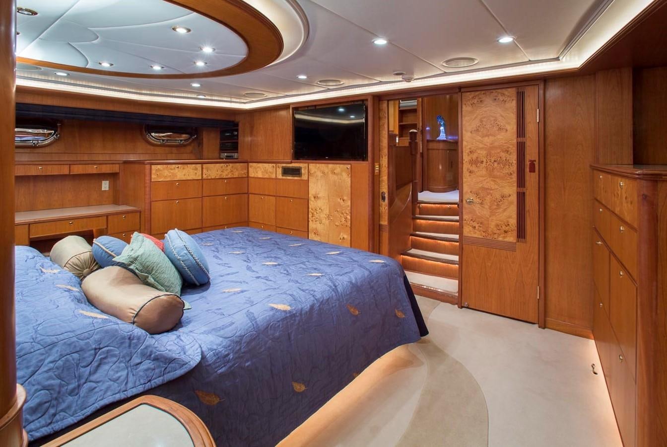 a person lying on a bed aboard SILVER WINGS Yacht for Sale